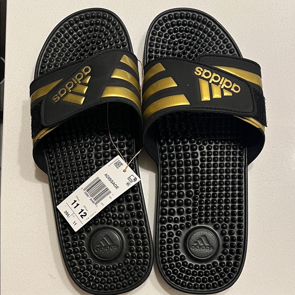 Adidas Black Slides with Gold Stripes